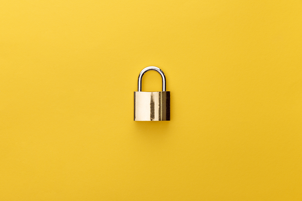 padlock on yellow background